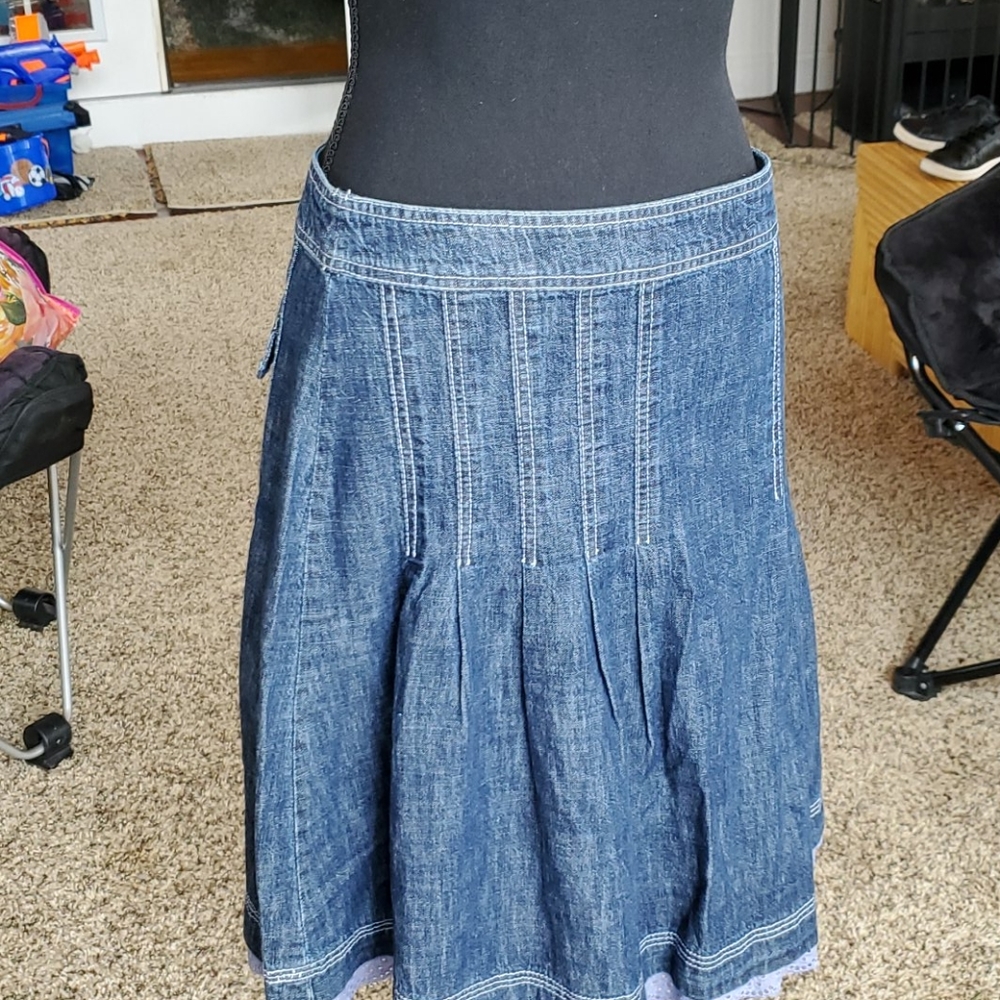 Cute denim skirt with eyelet detail at hem